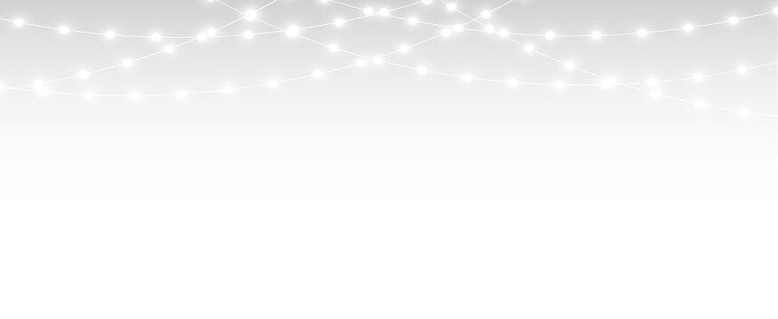 Christmas glowing string light and garland streamer overlay with soft bokeh festive illumination.