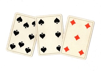 A hand of vintage playing cards isolated on a white background.