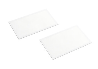 Two blank white rectangular cards overlapping and angled on a transparent background isolated on transparent background