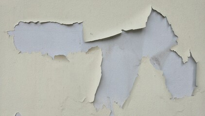 Old concrete wall painted yellow, peeling paint, scratches, dilapidated wall, wall has a cracked...