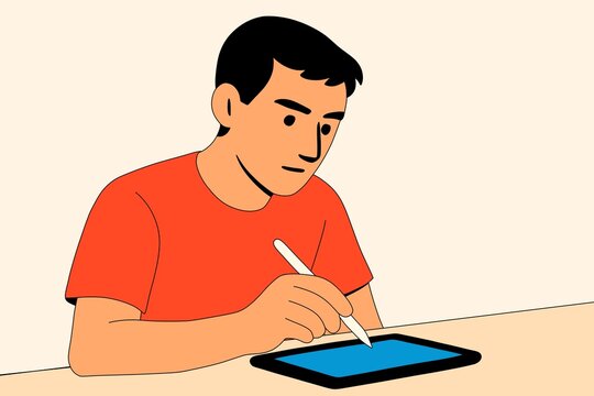 Man drawing with stylus on digital tablet showcasing creativity