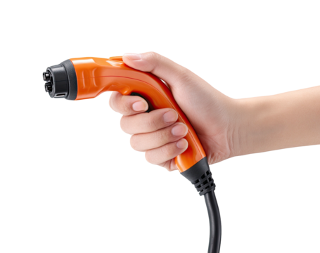 Hand holding orange electric vehicle charging connector