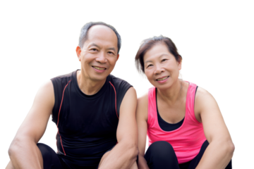 Healthy Senior Couple Smiling: A senior couple radiates joy and vitality as they sit side-by-side, their smiles reflecting a shared journey of health, happiness, and active living.