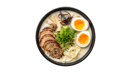 A beautiful bowl of authentic Japanese ramen with creamy pork broth chashu slices a soft boiled egg noodles and fresh scallions viewed from directly above