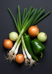 A vibrant and fresh assortment of green onions, yellow onions, and crisp green bell peppers, perfect for healthy cooking ingredients ,onion ,texture ,green pepper