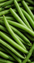 A vibrant arrangement of freshly harvested green beans, showcasing their crisp texture and natural color. Perfect for healthy cuisine concepts ,plant ,bounty ,natural