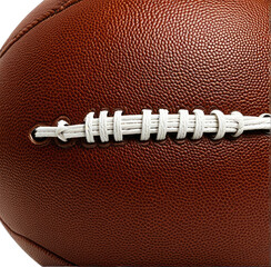 Close-up shows textured brown football with white laces