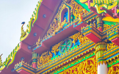 Suwankeereewong Temple wat golden Buddhist architecture details in Patong Thailand.