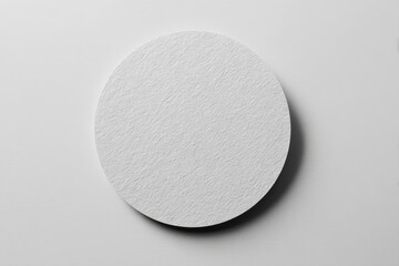 Oval textured element on light background for modern minimalist design and clean aesthetics in visual compositions
