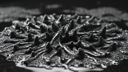 Ferrofluid Reacting to Magnetic Field Creating Spikes - Powered by Adobe