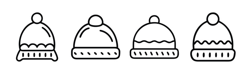 Set of four cozy knitted beanies with pom poms for winter warmth