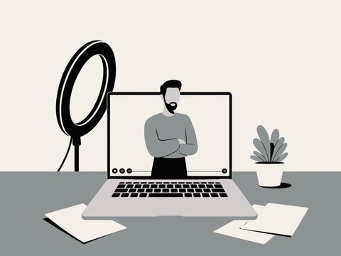 A contemporary workspace featuring a laptop with a virtual meeting scene, highlighting the importance of digital communication in today's work-from-home environment.