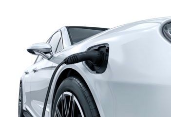A white electric car connected to a charging cable