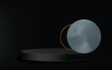 A sleek black cylindrical pedestal displays a metallic circular object with a golden rim against a dark background.