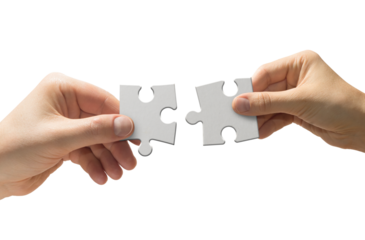 High quality PNG of close up two human hands hold white puzzle pieces. Teamwork concept. Isolated image on a transparent background