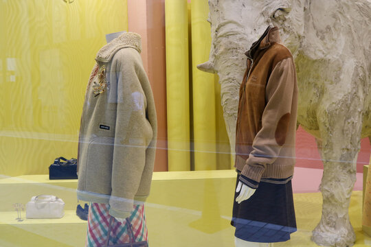 TOKYO, JAPAN - October 8, 2025: A Miu Miu display in the window of Dover Street Market Ginza.