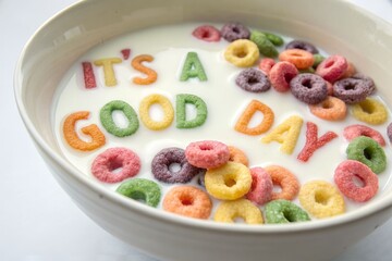 Colorful fruit loop style cereal and milk splash in speckled bowl with floating text message.