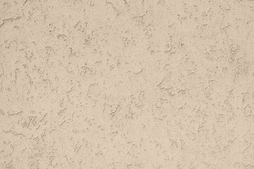 Beige stucco textured wall surface background
