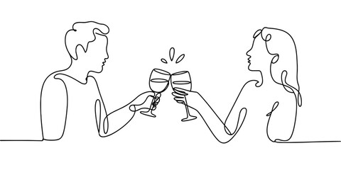 a man and woman clinking wine glasses, symbolizing celebration, romance, date night, or friendship.