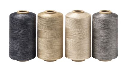 Four spools of thread rest on a plain black background view depicts three textile spools with fine thread material