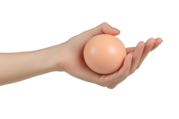 Hand squeezing a stress ball for relaxation during a calming moment at home