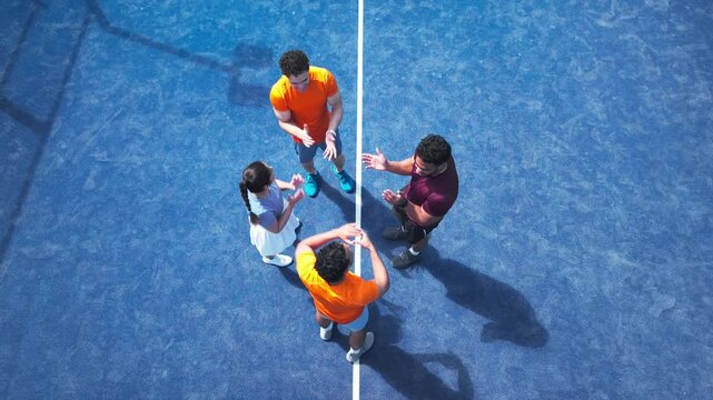 Above, applause and huddle with friends on court together for celebration, fitness or motivation. Exercise, hand stack and team building with group of people outdoor for competition or tournament
