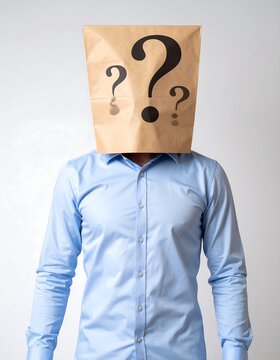 A person with a paper bag on their head, featuring question marks. They're wearing a blue collared shirt