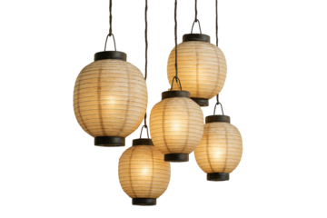 Cluster of Five Ornate Japanese Paper Lanterns Illuminated Warmly Against a Black Background