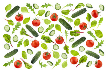 Salad mix of fresh bumpy cucumber, red cherry tomatoes, green leaves of spinach, chard, arugula as pattern. Isolated. Studio shot. Perfect as design for healthy salads, detox diet, wholesome food.