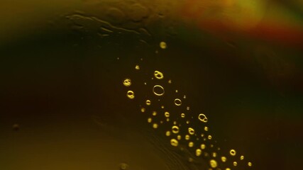 Yellow liquid surface, phenomenal structure, green oils on a dark background, colourful abstract, surrealistic art, iridescent effect