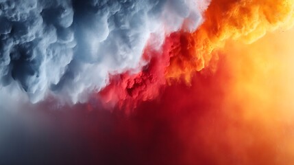 Obraz premium Dramatic Colorful Smoke Clouds with Fiery Red and Bright Yellow Against Dark Background
