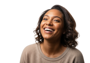 Woman smiling with joy in a light-colored sweater, capturing a moment of happiness indoors