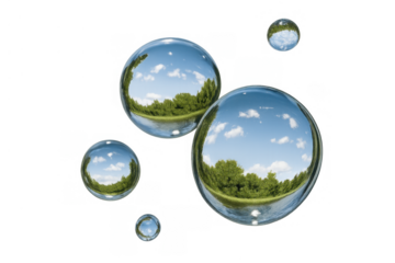 Water drops showing a distorted reflection of a natural landscape with clouds and trees, creating a clean ecological concept