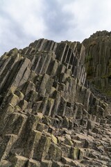 Detail view of the landmark Panska Skala basalt column rock formation in the north of the Czech Republic