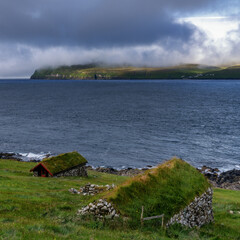 traditional sod-roof stone houses in the hamlet of Skardanes on Sandoy Island in the Faroe Island archipelago