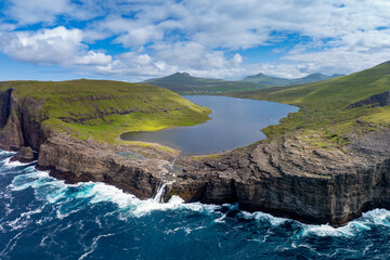 aerial view of Sorvagsvatn Lake and Bosdalafossur Waterfall on Vagar Island in the Faroe Islands