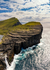 vertical view of Sorvagsvatn Lake and Bosdalafossur Waterfall on Vagar Island in the Faroe Islands