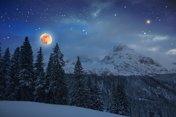 Full moon and abstract stars sky in a winter mountains.