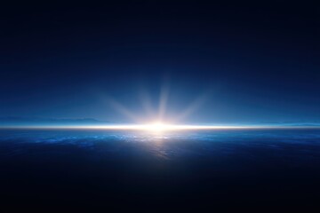 Fototapeta premium Sunrise over the ocean, viewed from space, with bright sunburst