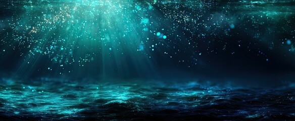 Deep teal underwater scene with sunlight