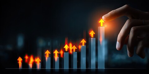 Hand pushing a graph upward showing growth