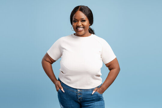 Black plus size woman smiling expressing body positivity