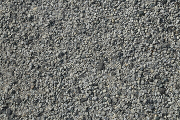 Crushed gravel with a rough, granular texture