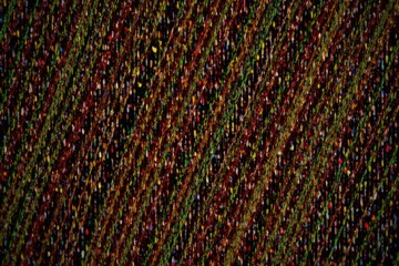 Abstract textile transformation, showcasing color palette evolution from dull to vibrant. Abstract art of colorful threads transforming from muted tones to vibrant hues, woven into a dynamic, textured