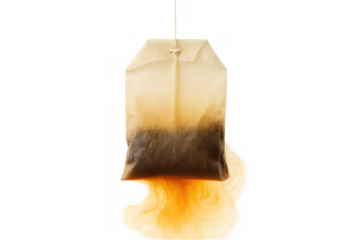 Tea bag steeping in hot water releasing flavor and color, a brewing infusion on transparent background