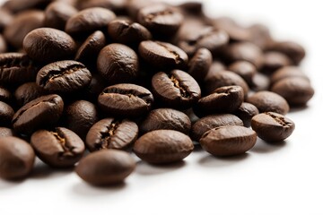 Coffee beans on a white background, highlighting their texture, aroma, and culinary importance.