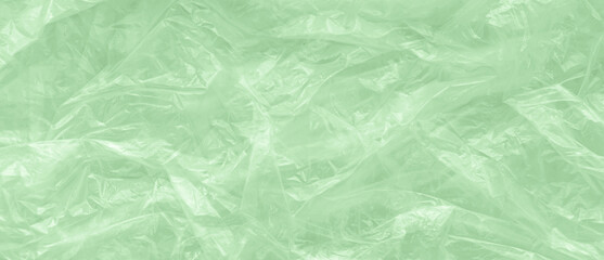 Green plastic bag texture background. Reuse and Recycle cocept.