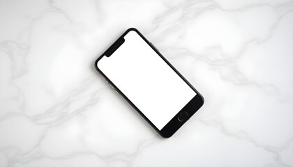 A black smartphone with a blank screen rests on a marble surface.