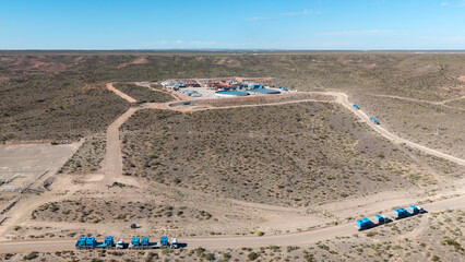 Vaca Muerta, Argentina, October 18, 2025: Aerial view of unconventional oil and gas extraction (shale oil) in Añelo, Neuquén. Fracking equipment.