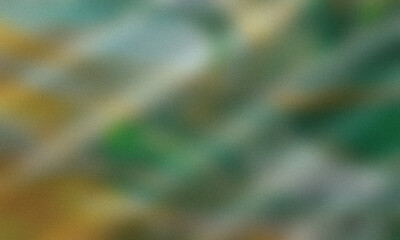 Abstract watercolor background with vibrant yellow green and teal blended textures and subtle speckles